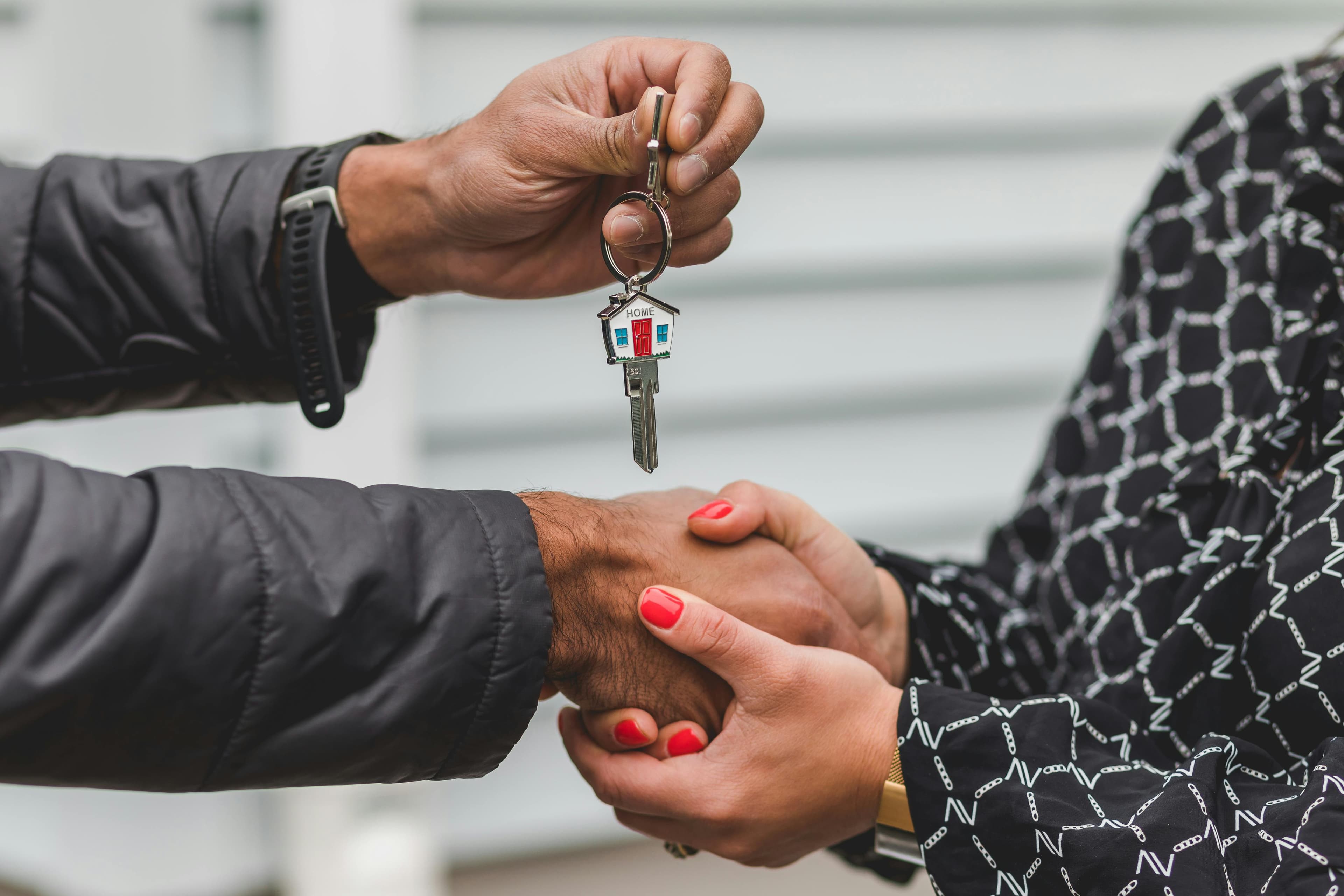 Couple signing property settlement paperwork